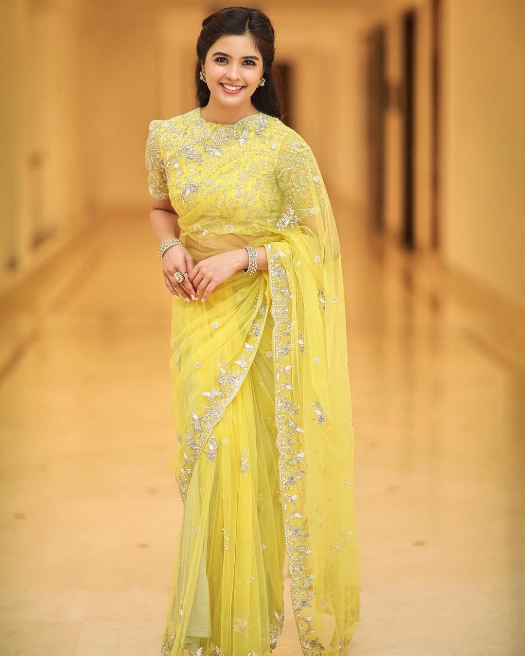 Timid yellow Net Saree