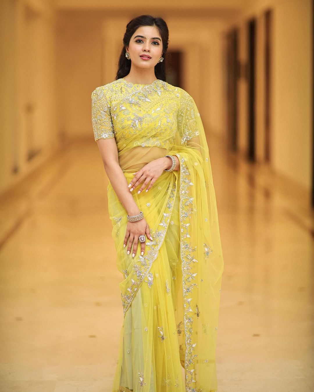 Timid yellow Net Saree