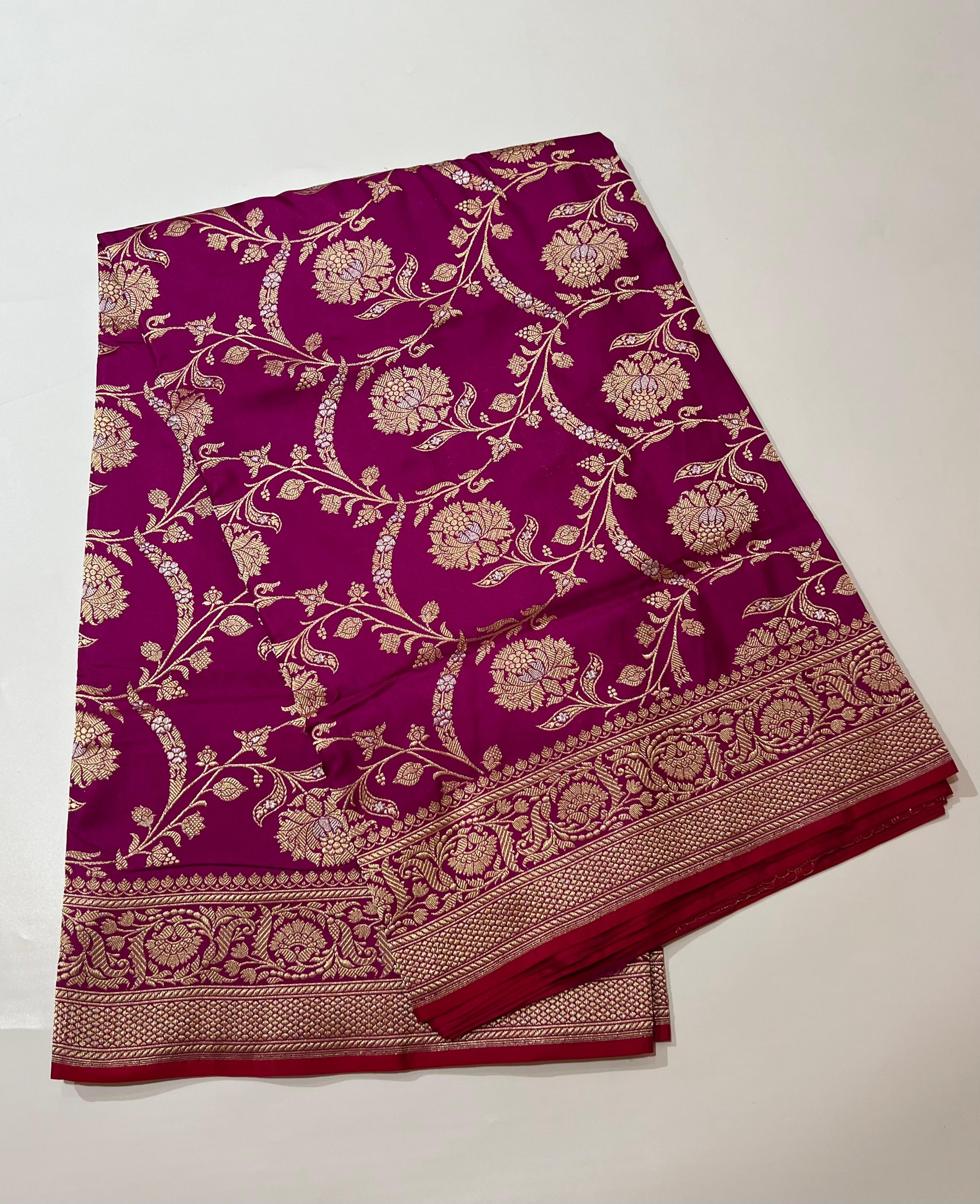 Zari work on rani pink Banarasi Saree