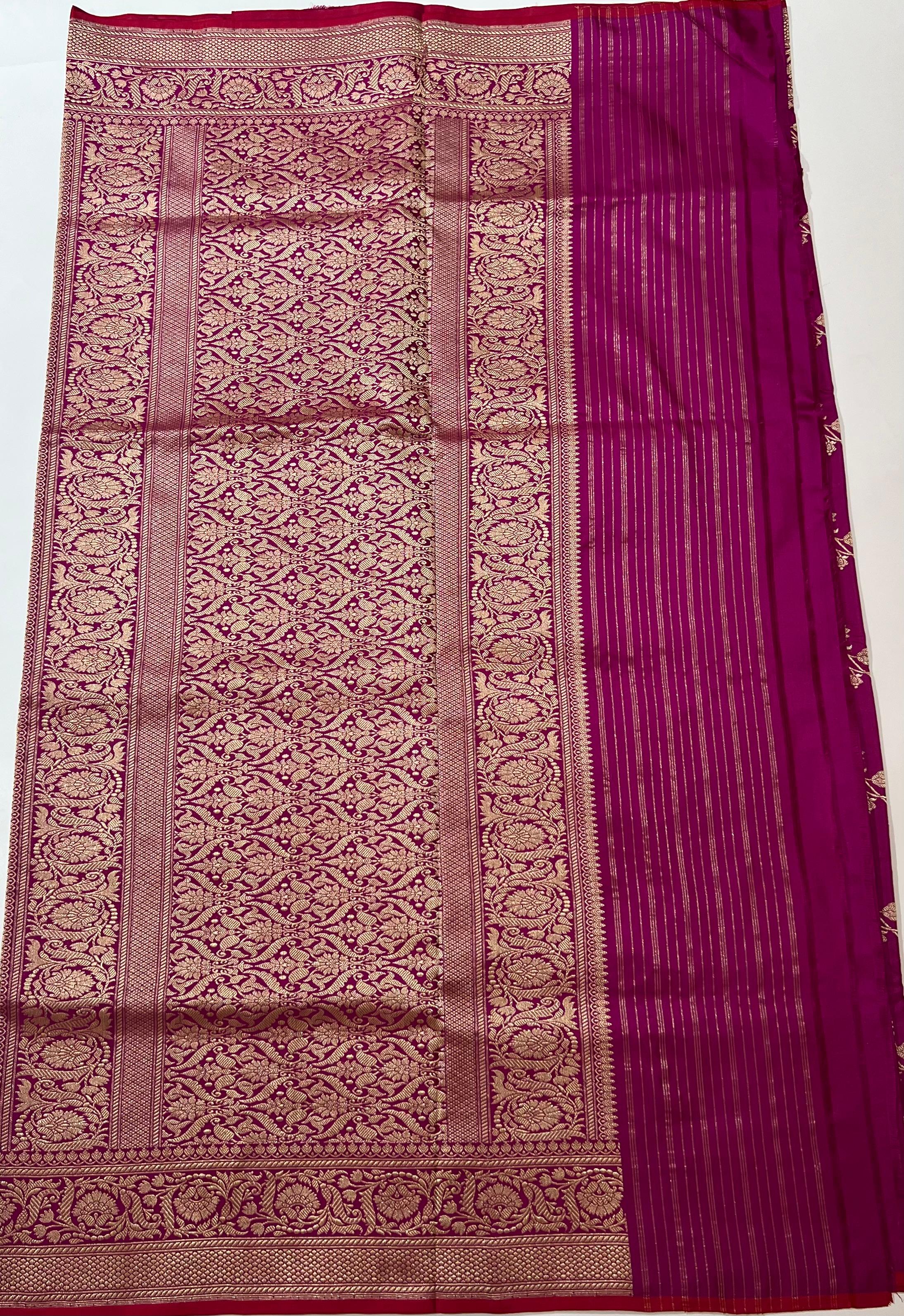 Zari work on rani pink Banarasi Saree