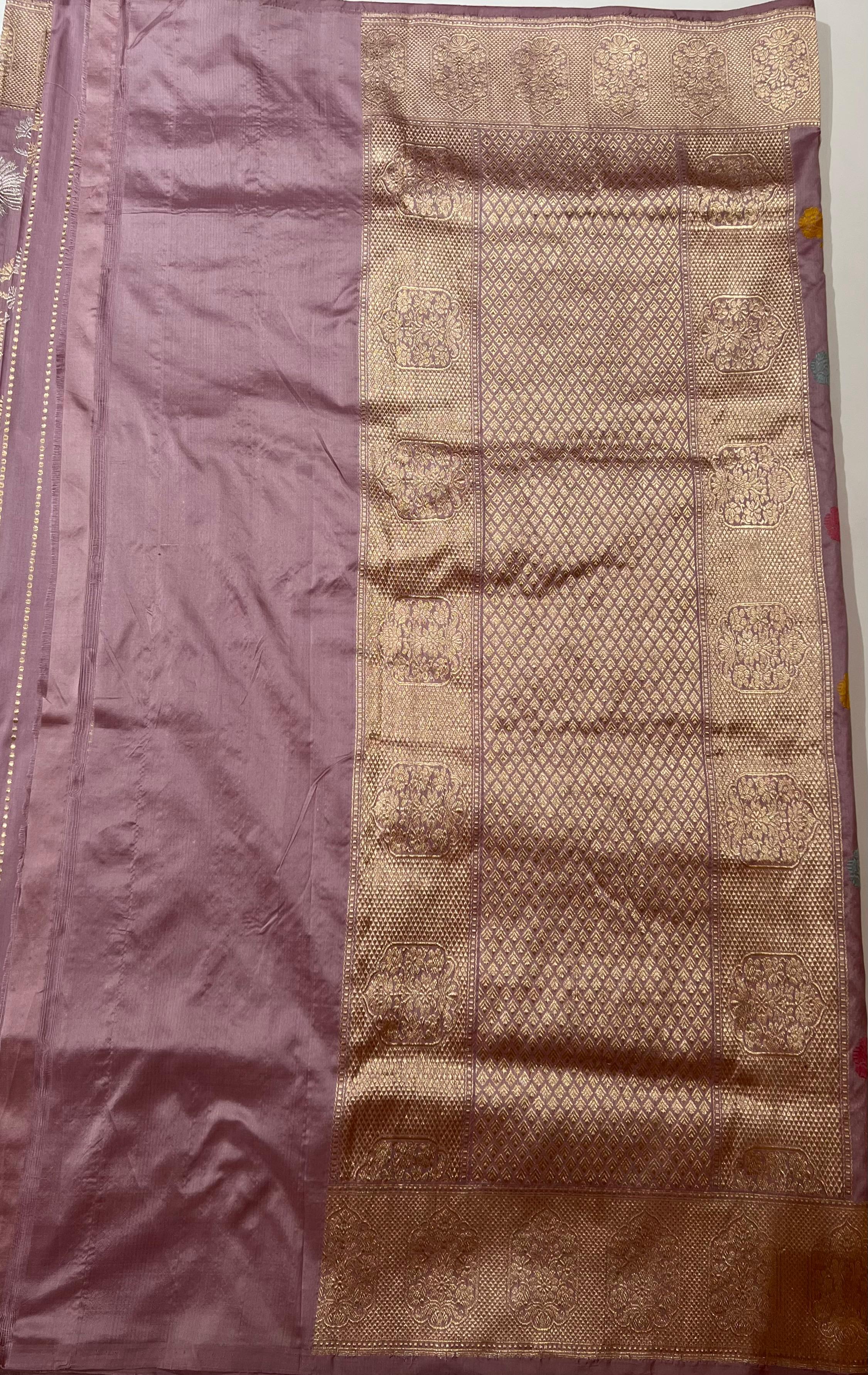 Zari work on lilac Banarasi Saree