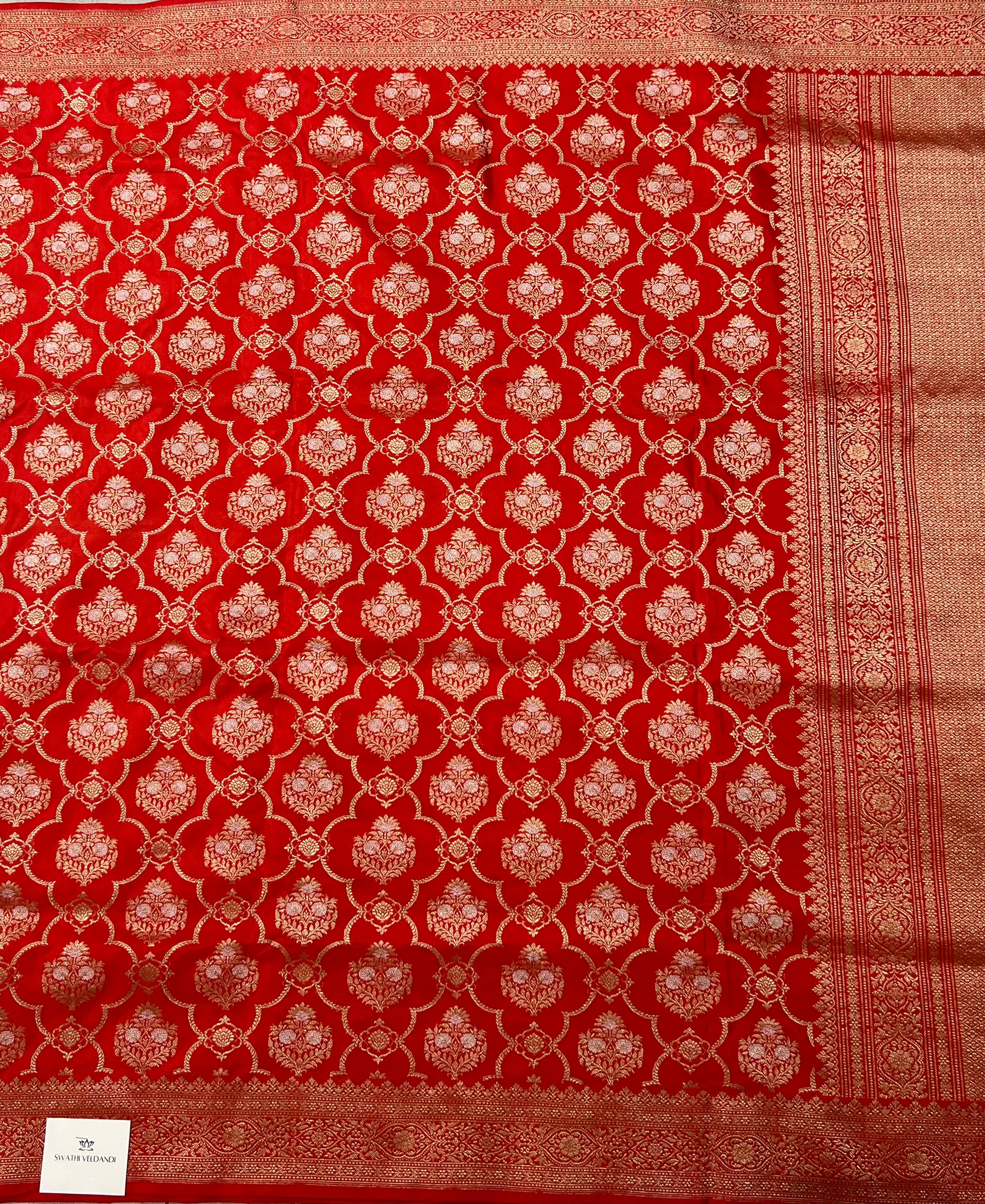 Floral Zari work on Bright Red Banarasi saree