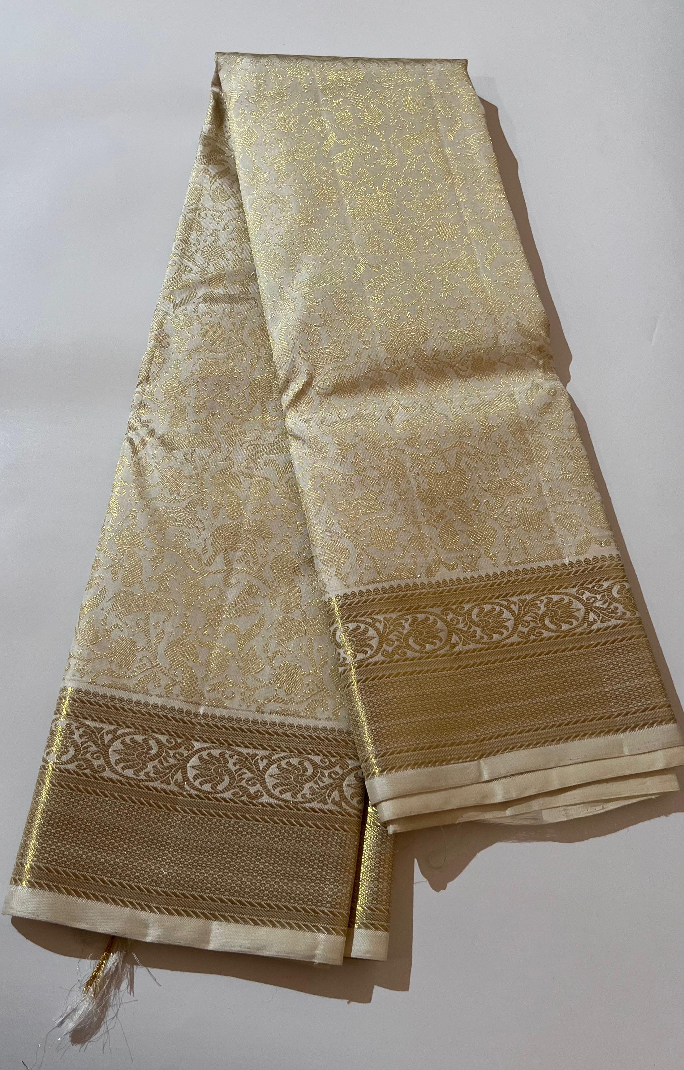 White and golden Kanjeevaram silk saree