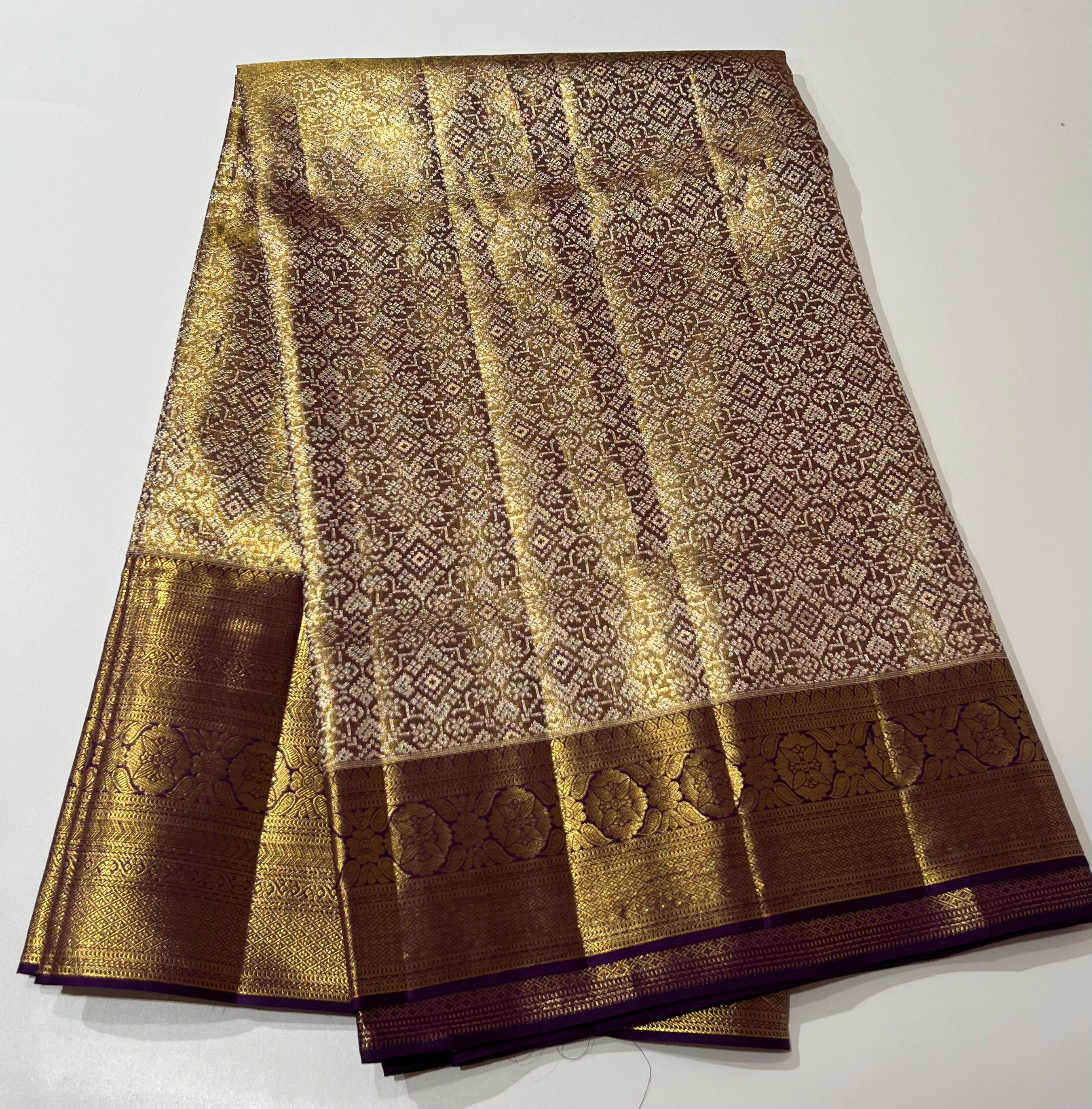 Violet and golden Kanjeevaram silk saree