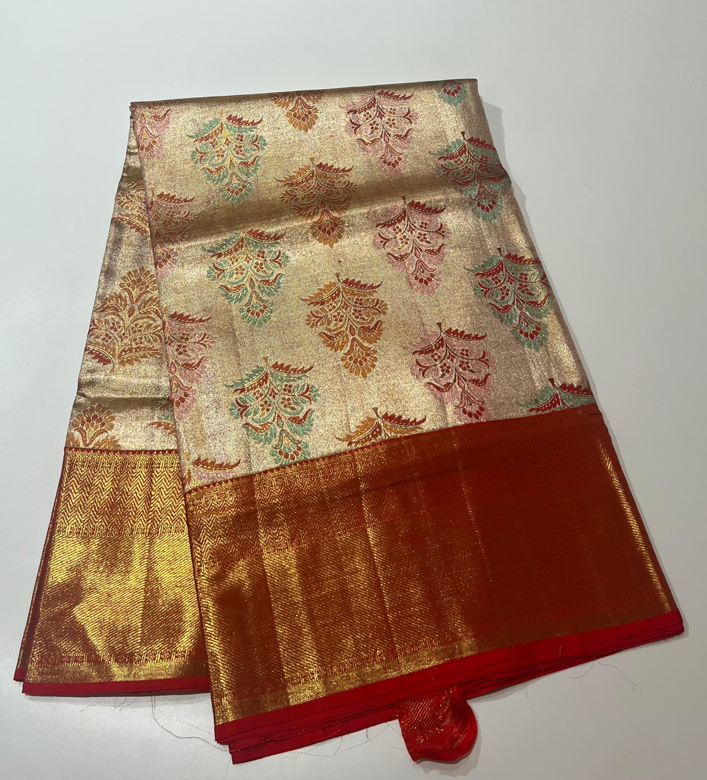 Ivory and red border Kanjeevaram silk saree