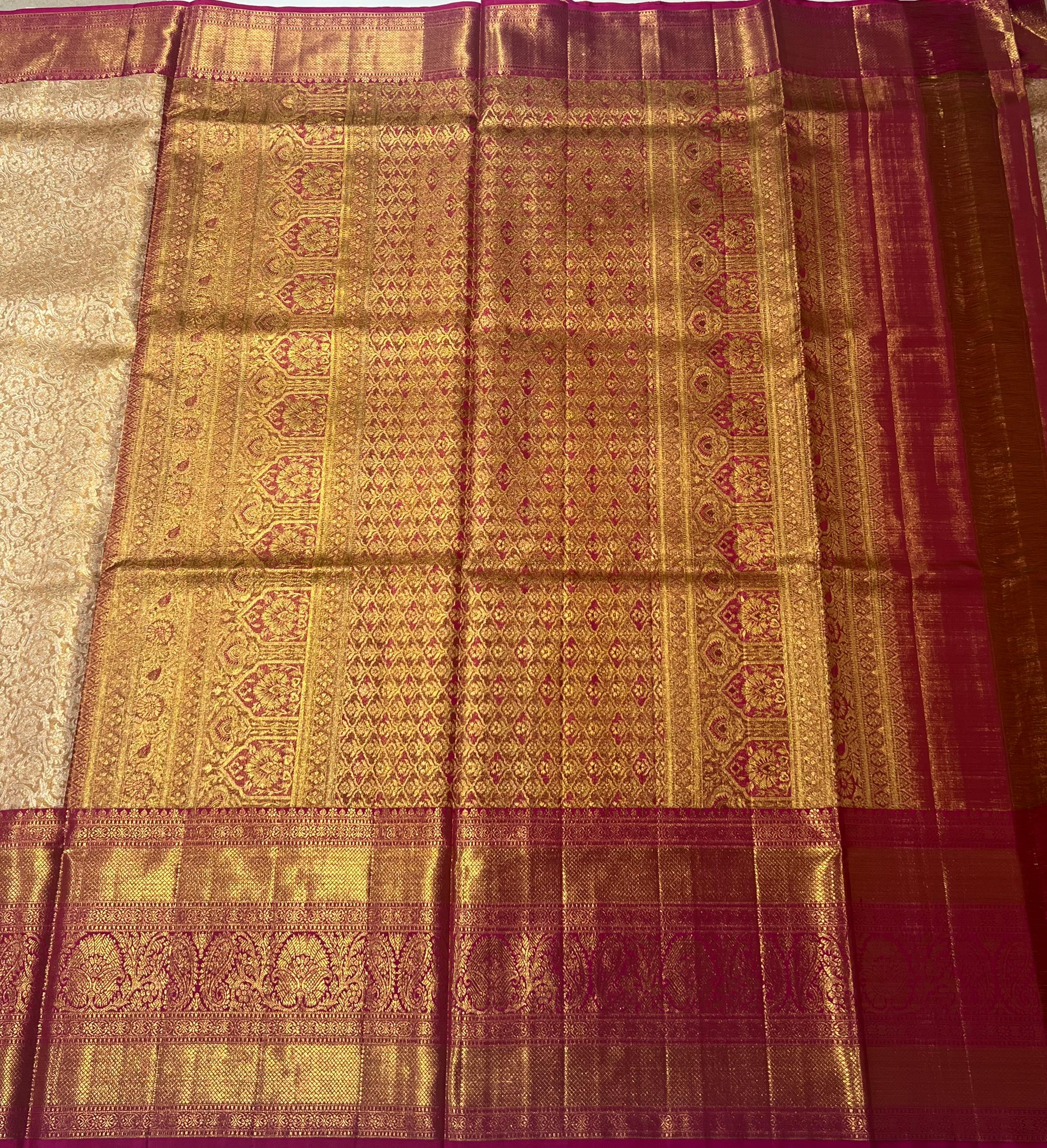 Cream and pink border kanjeevaram silk saree