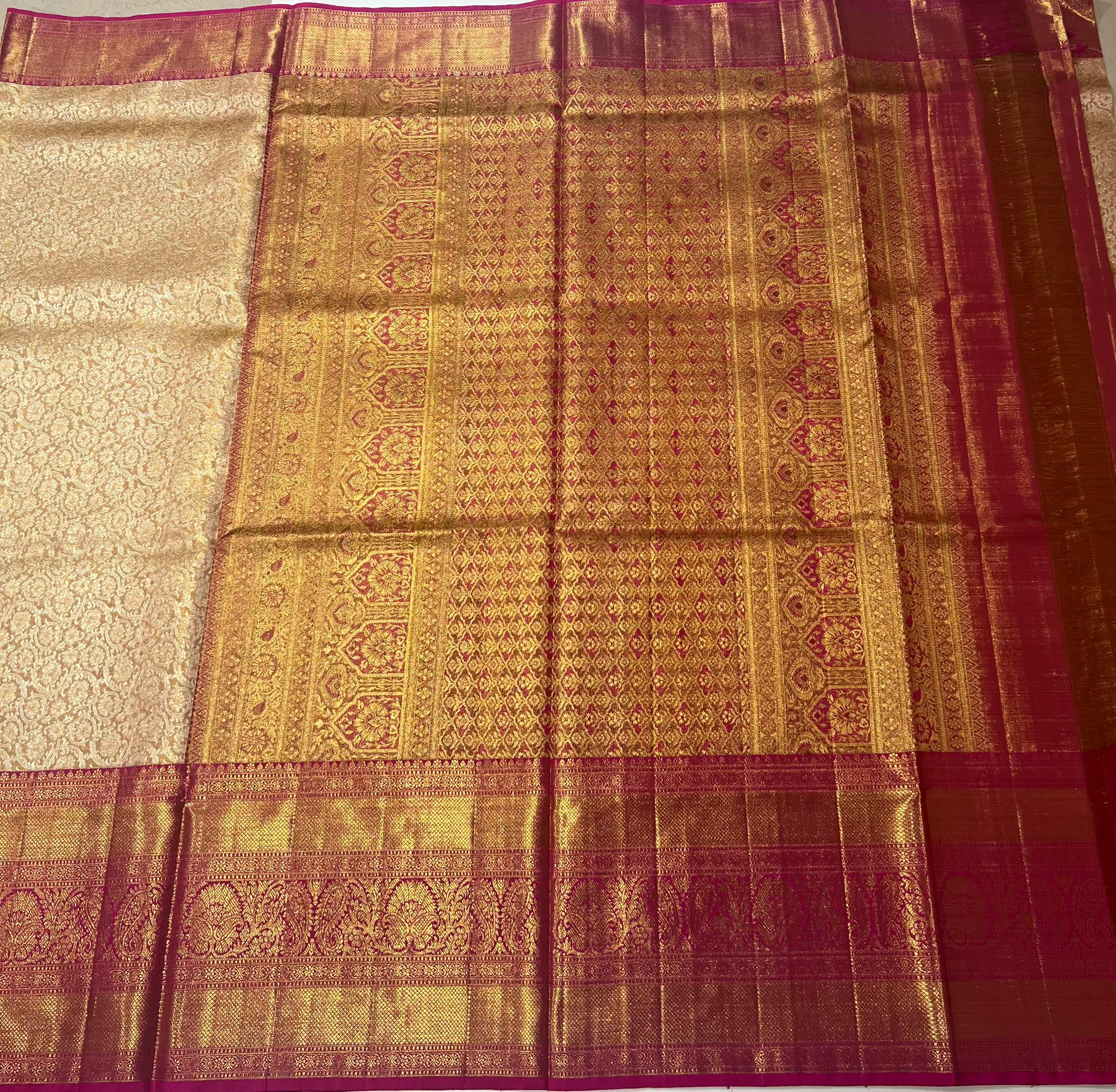 Cream and pink border kanjeevaram silk saree