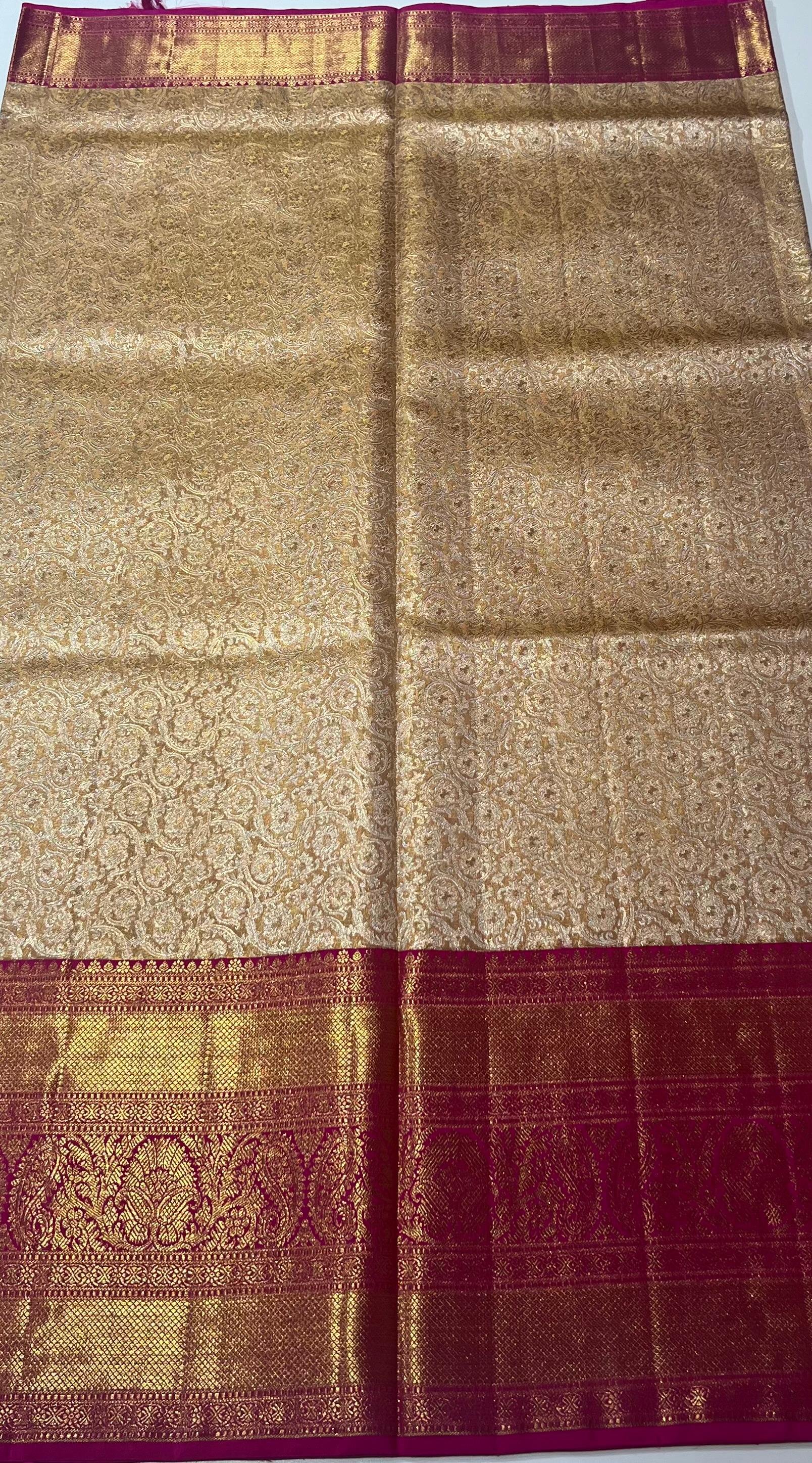 Cream and pink border kanjeevaram silk saree