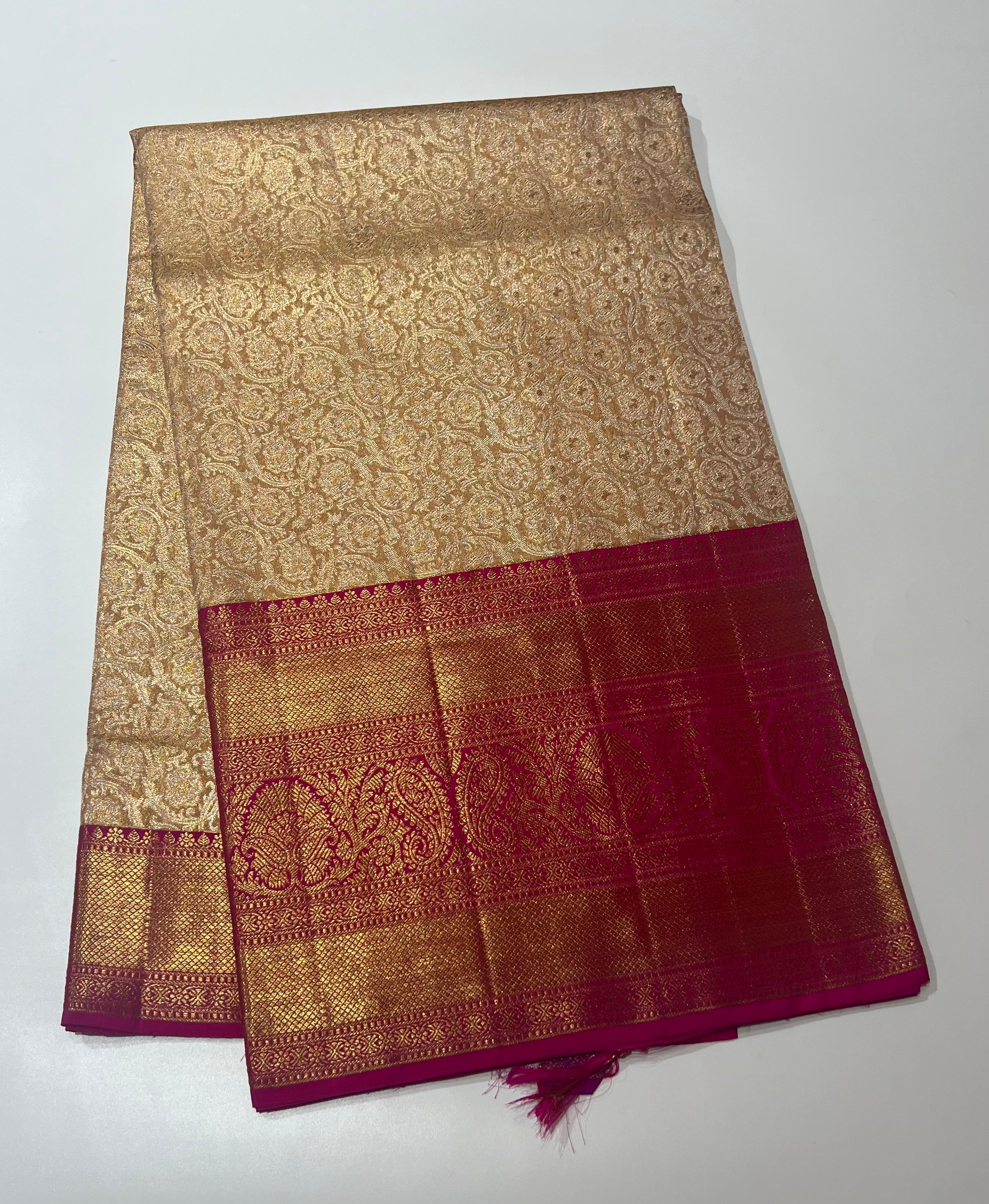 Cream and pink border kanjeevaram silk saree